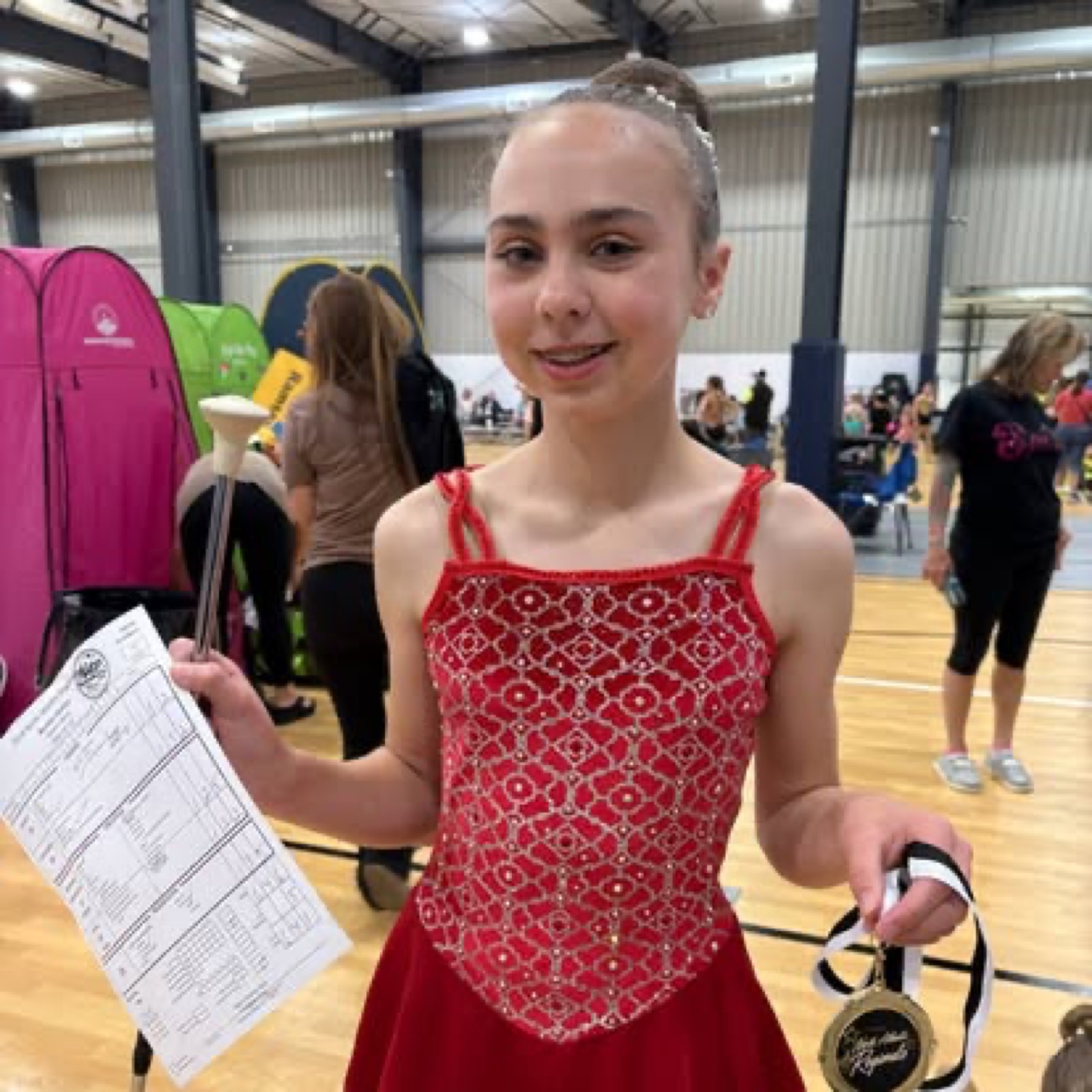 Spirit Baton twirler with her gold medal