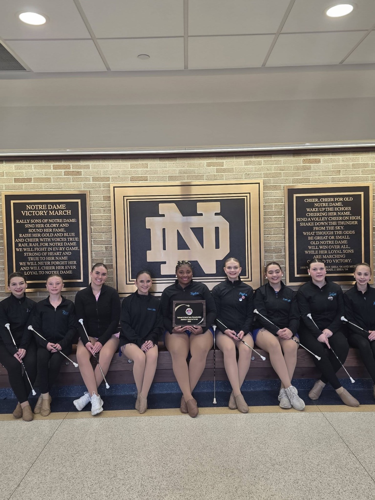 Spirit Baton with their championship plaque at America's Youth on Parade, Notre Dame
